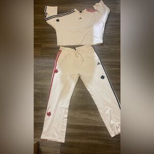 WOMEN ADIDAS SET WORN ONCE. TOP IS XS FITS LIKE A LARGE OVER SIZED